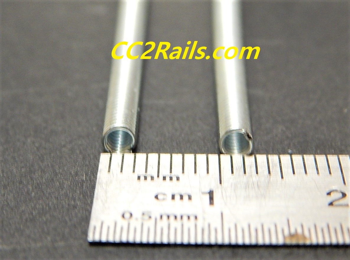 Deux Ressorts CC0415 DEUX RESSORTS D'ENTRAINEMENTS POUR AXE 2 mm RE- MOTORISATION...